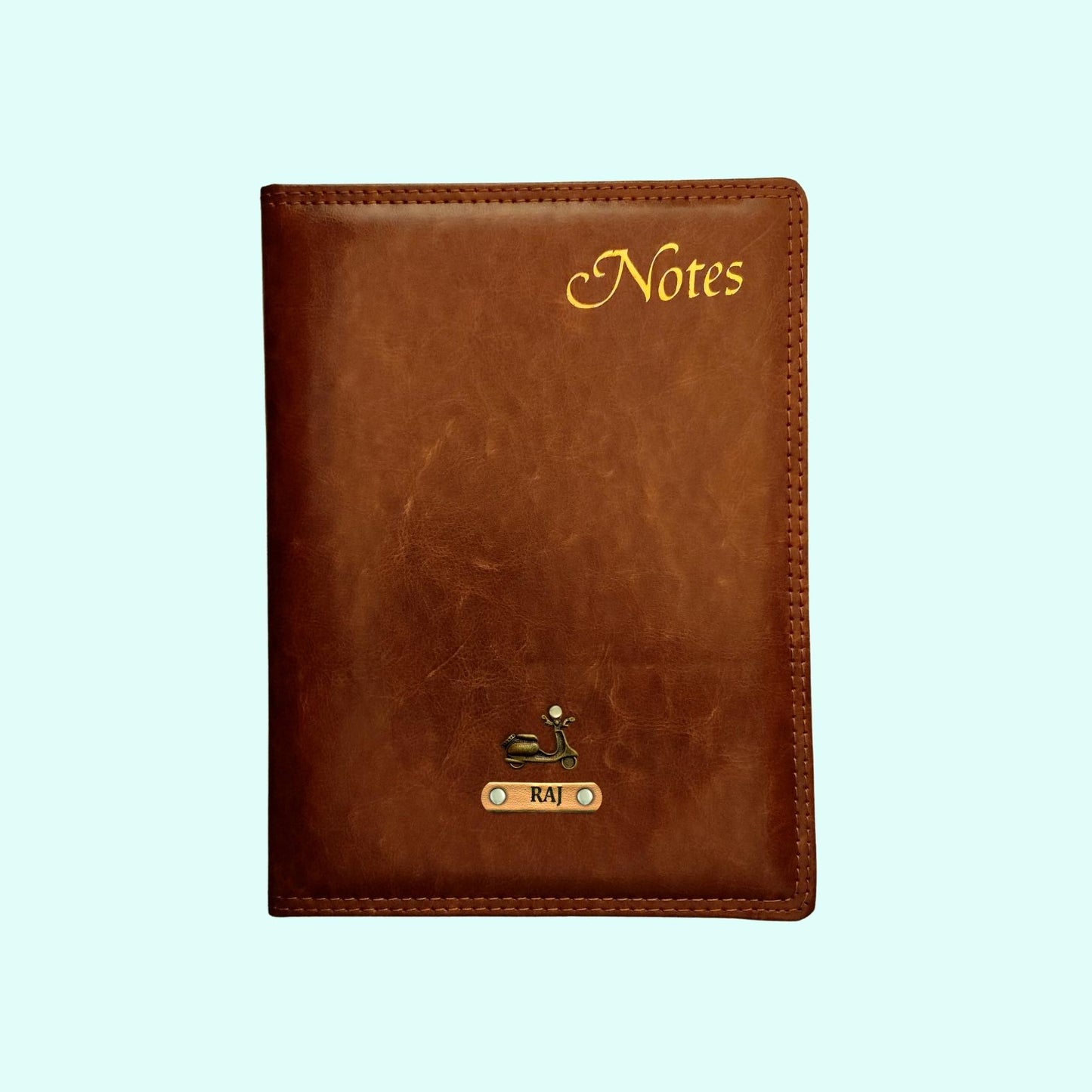 Tan Notebook with Gold Title